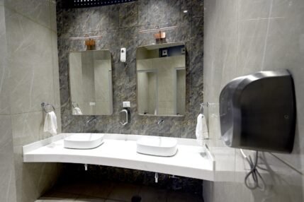 Interior view of the Sulabh Aspirational Toilet showing the baby care station and clean hygiene setup.
