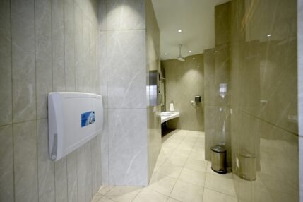 Baby changing station inside the Sulabh public toilet facility designed for comfort and user convenience.