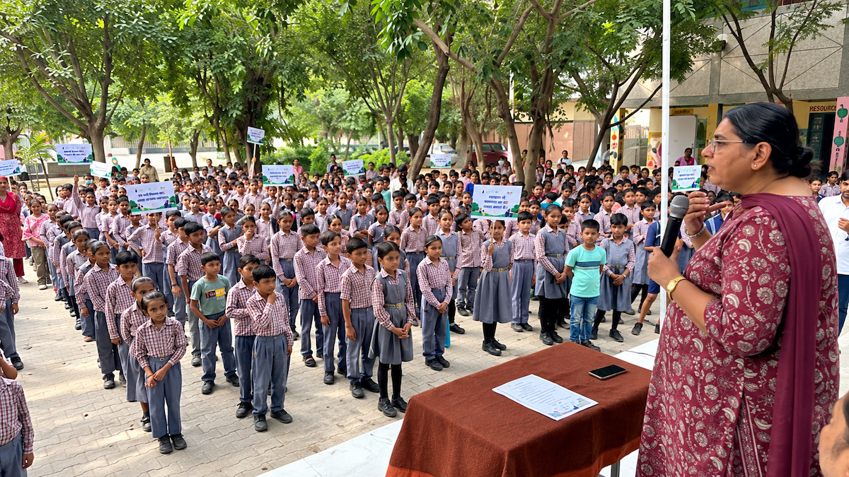 school-children-swachhata-rally-placards-palam-dabri-road-delhi Dr Namita Mathur, Sulabh-IIHH EIACP Coordinator, addresses students on cleanliness and hygiene during the Swachhata Hi Seva 2026 awareness session